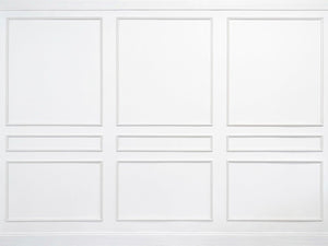 Self-adhering wall moulding kit with nine fully assembled frames, perfectly proportioned for 10'–11' ceilings. Handcrafted from real wood in the USA.