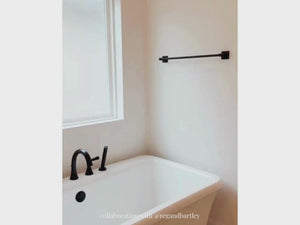 Classic Tall Nine Piece Wall Moulding Kit covering three walls in a bathroom with 10' ceilings. Three-panel layout with middle moulding detail.