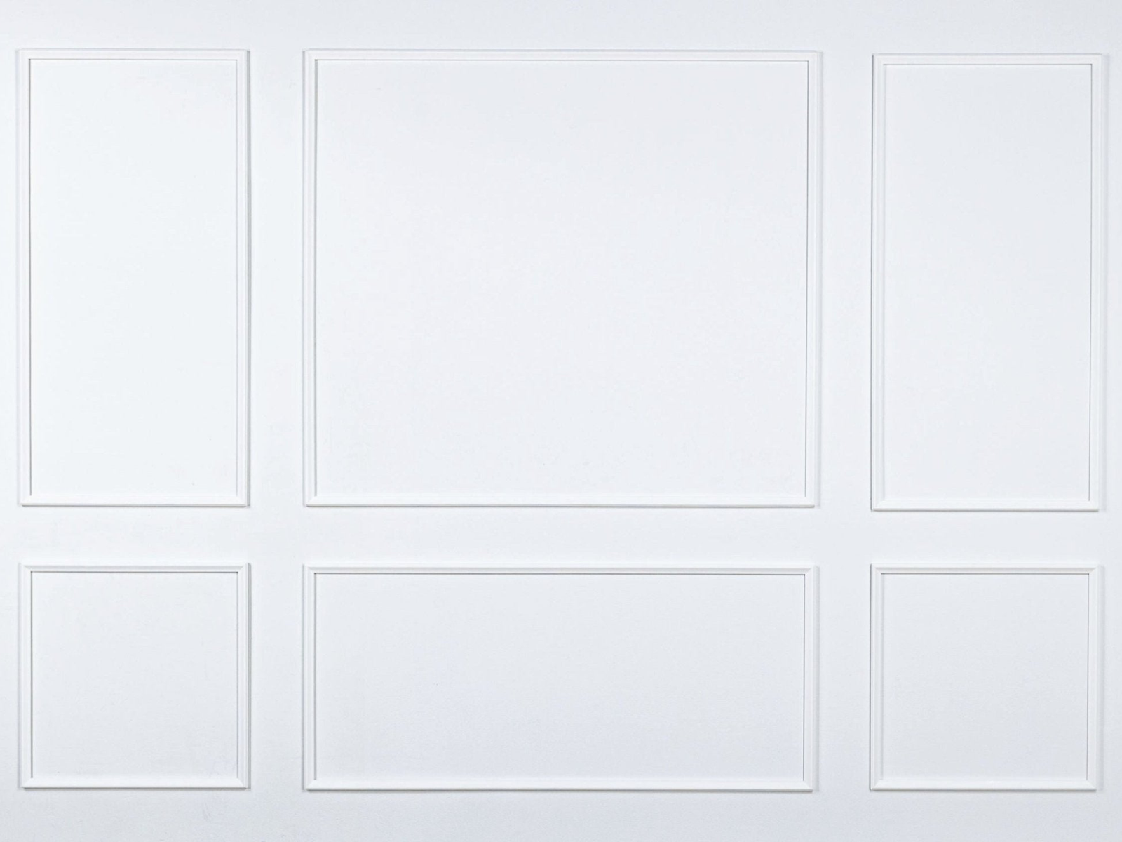 Six Piece self-adhering wall moulding kit installed on a finished wall, creating a complete two-panel feature wall with real wood mouldings