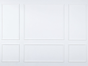 Six Piece self-adhering wall moulding kit installed on a finished wall, creating a complete two-panel feature wall with real wood mouldings