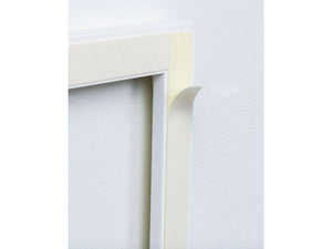 Close up picture of back of real wood moulding frame showing adhesive for easy application for Classic Ten piece Wall Moulding Kit Primed