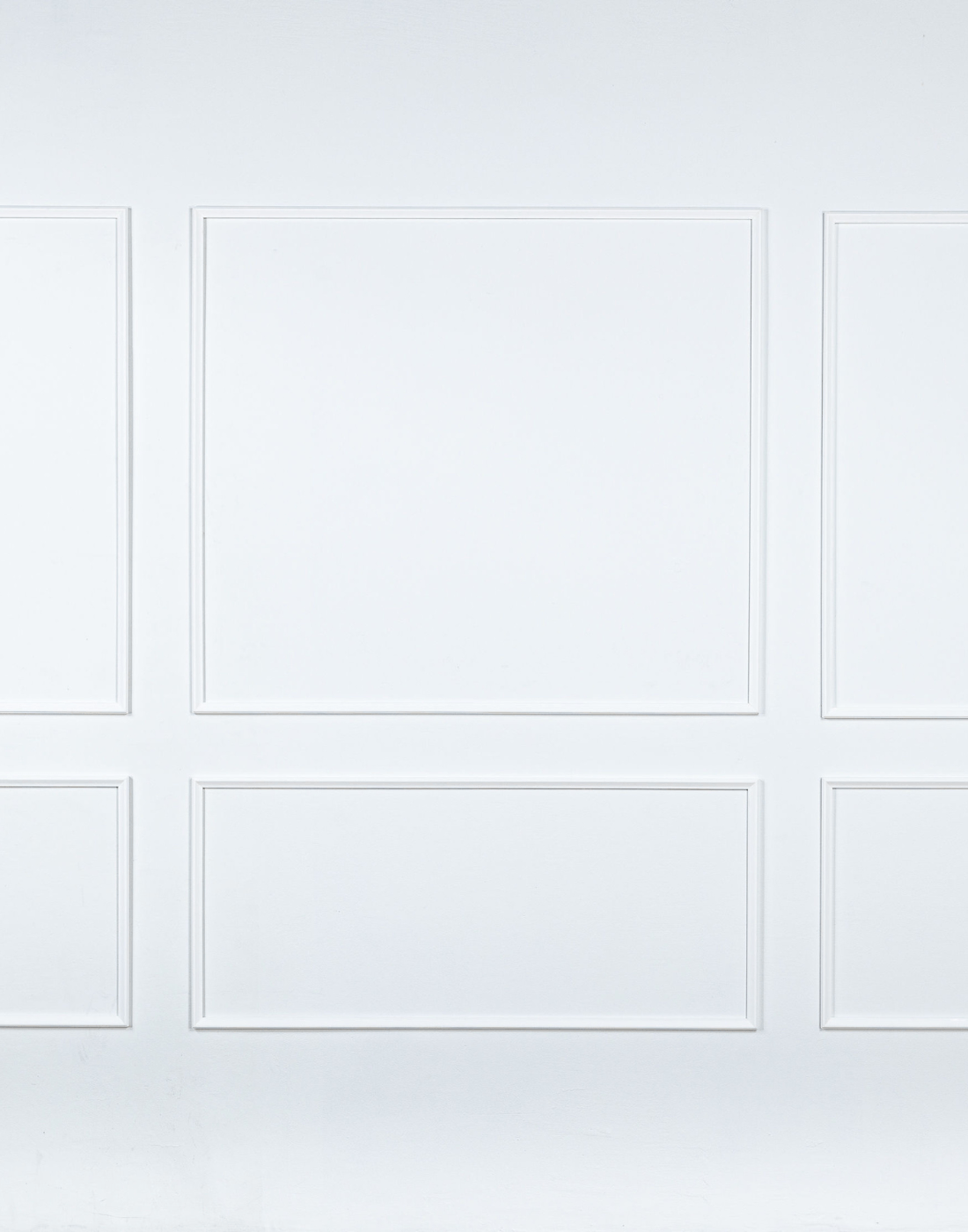 Removable and reusable self-adhering wall moulding kit with three top mouldings and three bottom mouldings, handcrafted from real wood in the USA. Renter-friendly with complimentary replacement adhesive.