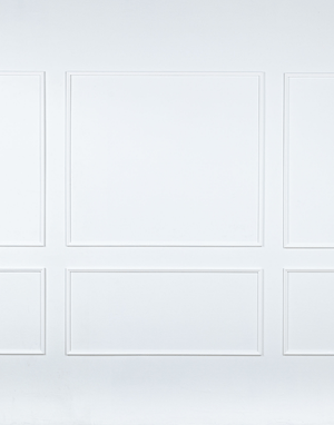 Removable and reusable self-adhering wall moulding kit with three top mouldings and three bottom mouldings, handcrafted from real wood in the USA. Renter-friendly with complimentary replacement adhesive.