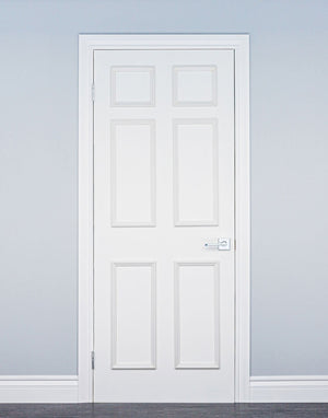 Removable six piece door moulding kit on white interior door