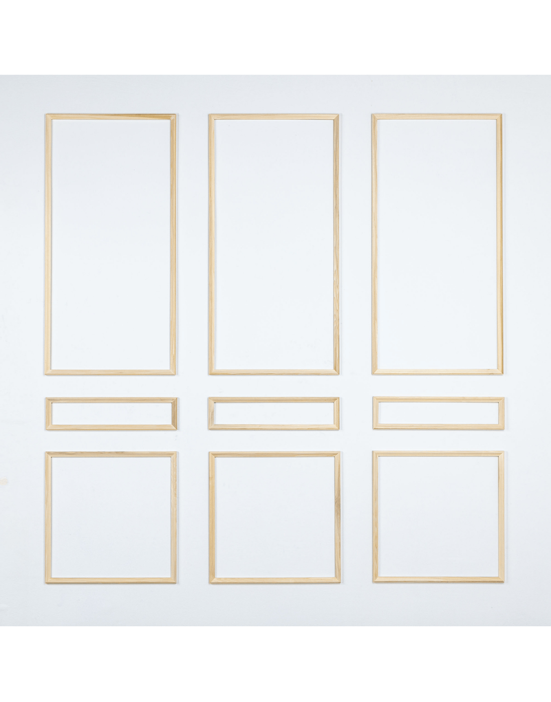 Stain grade Poplar nine piece wall moulding kit by Luxe Architectural — three-panel classic raised panel layout, fully assembled, handcrafted in the USA